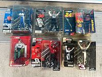 All eight packaged NASCAR driver figures displayed