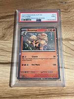 Front of PSA-encapsulated Arcanine ex promo card showing artwork, stats, PSA label