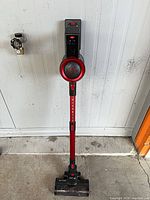 Full view of Buture cordless stick vacuum cleaner standing upright