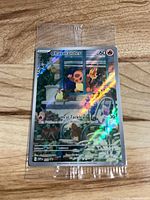 Front view of sealed holographic Charmander promo card
