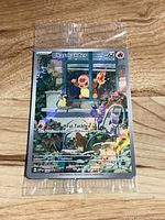 Front view of sealed Charmander promo card displaying artwork, HP, and attack text