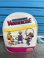 Front view showing Mousercise artwork and pink pocket