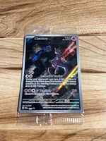 Front of sealed Mewtwo 151 promo card showing artwork, HP, foil sheen