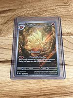 Front of Ninetales card showing artwork, moves, HP and card number inside toploader