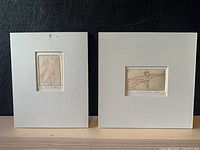 Both matted etchings side by side