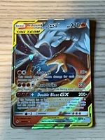 Front of Reshiram & Charizard GX Tag Team card showing artwork, stats and moves