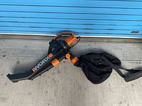 Full view of Worx blower vac with bag attached