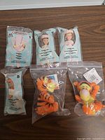 Front view of all six packaged items on table