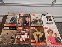 All eight Life magazines laid out