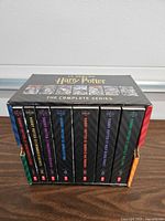 Front angle of boxed set showing all seven books and slipcase