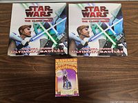 Front view of two Star Wars Visual Guide books and boxed Harry Potter Secret Box