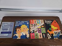 Front covers of all four vintage books