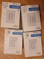Four sealed SPEX boxes, two dimmers two room controllers