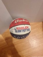 Top view showing Baden logo, Harlem Globetrotters wordmark and several signatures