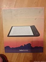 Front of sealed Kobo Forma retail box showing product image