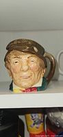 Front view of Royal Doulton Paddy character mug