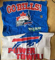 Blue Go Bills Toronto Series towel and white Power Towel displayed