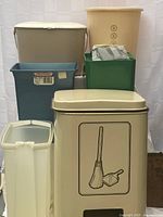 All six garbage pails and bins stacked together