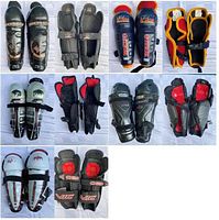 Nine pairs assorted brands and sizes