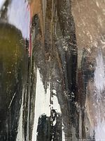 Close-up of glass surface showing bubbles and wear