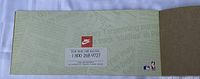 Interior page with ordering phone number, Nike swoosh and NBA logo