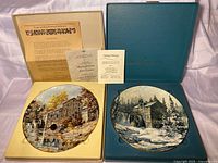 Both Keirstead plates in open cases with COAs visible