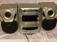 Front view of complete Panasonic stereo system with both speakers