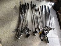 All clubs spread out on floor showing quantity and mix