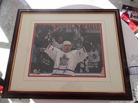 Full view of framed autographed Mogilny photo