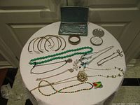 All jewellery pieces laid out on round table