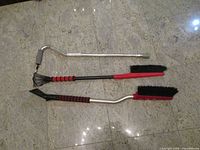 Top view: both snow brushes and cane full length