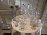 Full assortment of glasses on round table