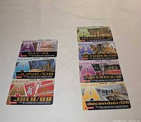 Seven TTC Adult Metropass cards laid out showing fronts: May, June, July, September, October, November, December 2008