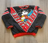 Front view of sweatshirt showing full graphic, red trim and sleeve stripes