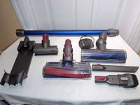 All eight Dyson V7 accessories laid out