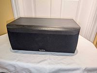 Front view showing grille and logo