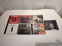 Front covers of all seven CD albums