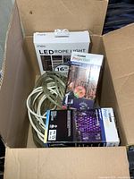 Box with two StarSpinner projector boxes and LED rope light coil