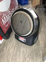 Front view of Coleman ProCat heater showing burner screen and base