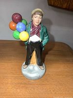 Full view of Royal Doulton Balloon Boy figurine front
