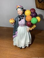 Front view of figurine showing full detail, colours, and pose