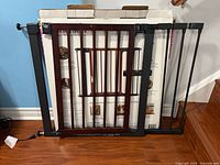 Gate front showing wood slats, steel frame, extension, and box liner