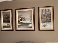 Full view of triptych hung on wall