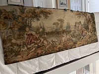 Front view of full tapestry showing scene and overall condition