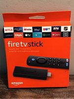 Front of sealed Fire TV Stick retail box