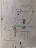 Assembly diagram showing multi-level cat tower design