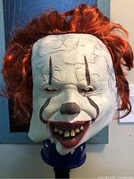 Front view showing mask face and hair