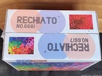 Top view showing RECHIATO No. 6661 and No. 6617 identifiers on sealed boxes