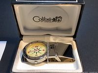 Money clip watch inside Colibri of London box