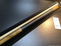 Full cue separated in case